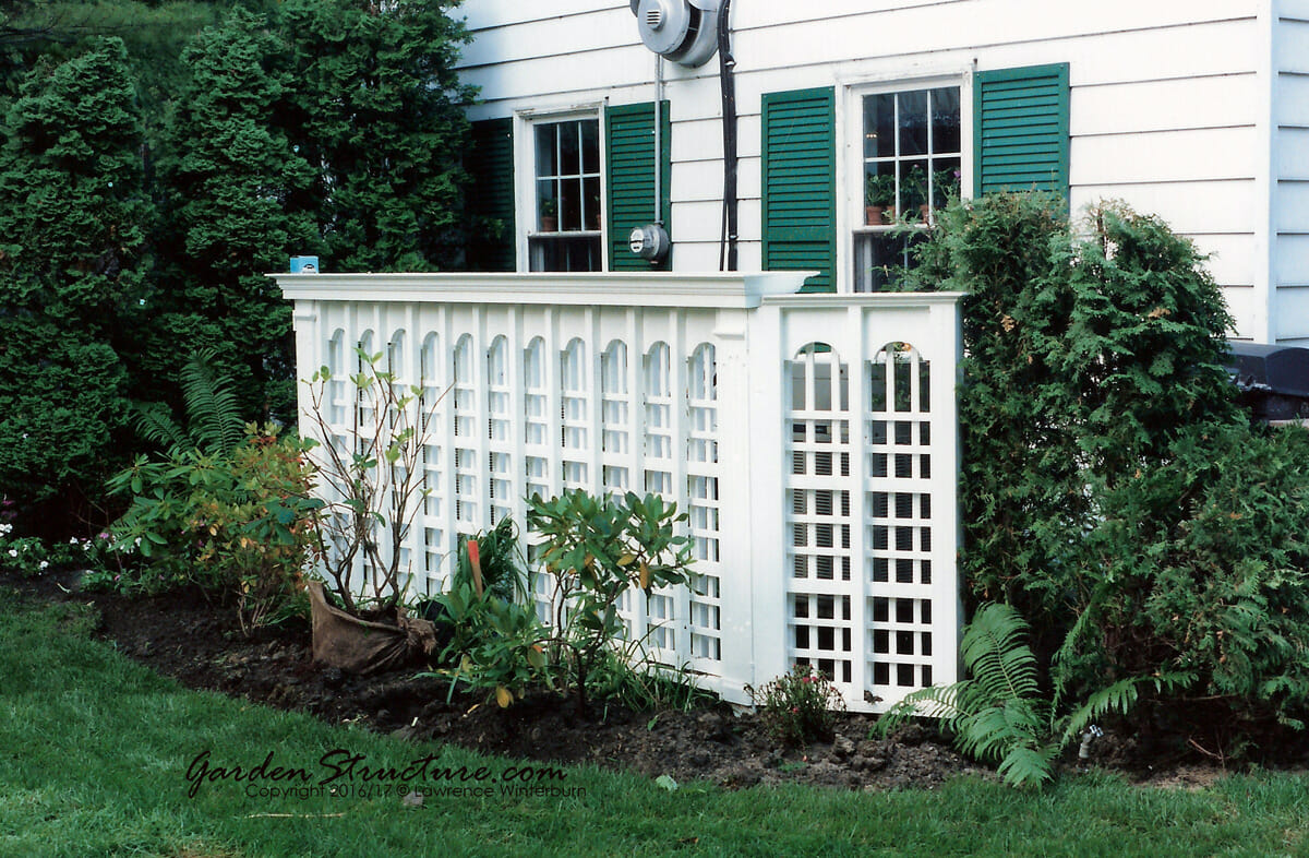 Architectural privacy screen for an air conditioner in the yard