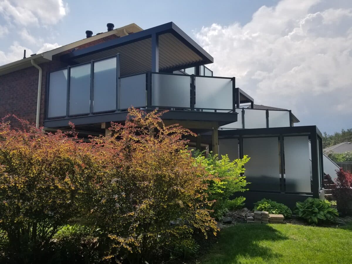 Very large deck in Barrie ontario with louvered canopies and privacy glass