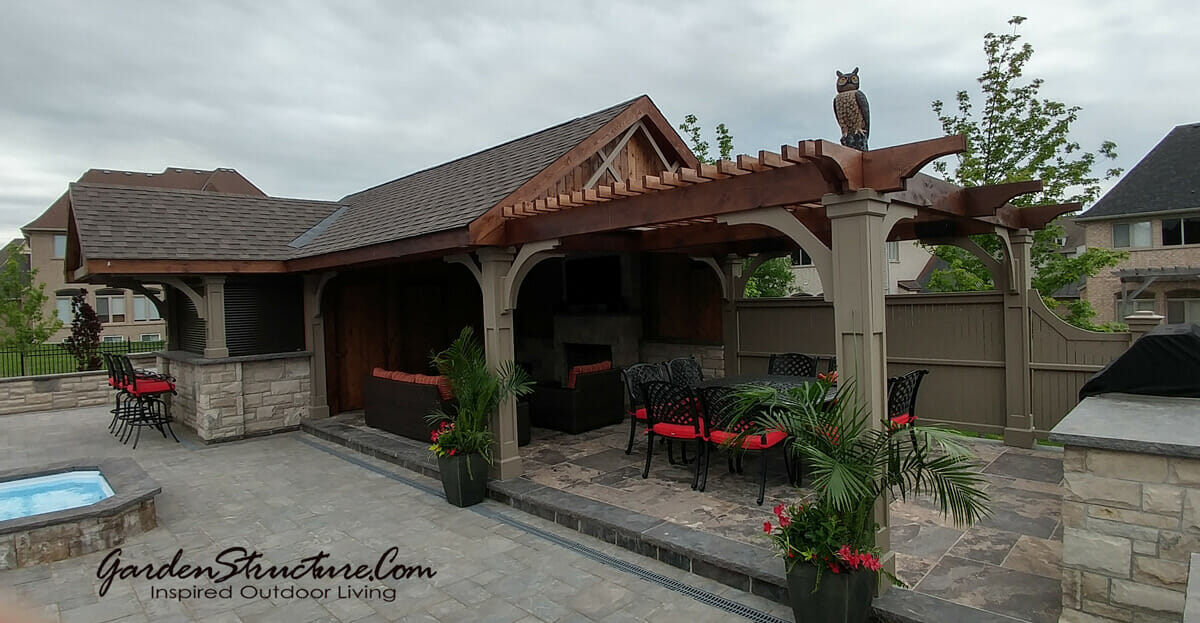 View of outdoor kitchen with pergola