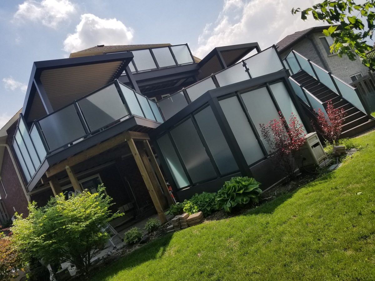 Deck Builders in Barrie glass rails and louvered roofs