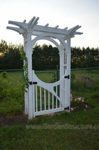 A garden arbor with inner arches and stylish gate