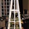 A gorgeous Planter with an obelisk trellis atop - Build it yourself with our plans!