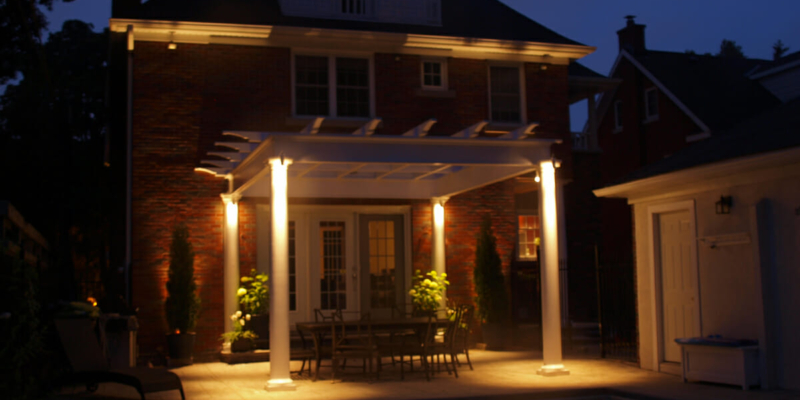 pergola with lights and turned columns