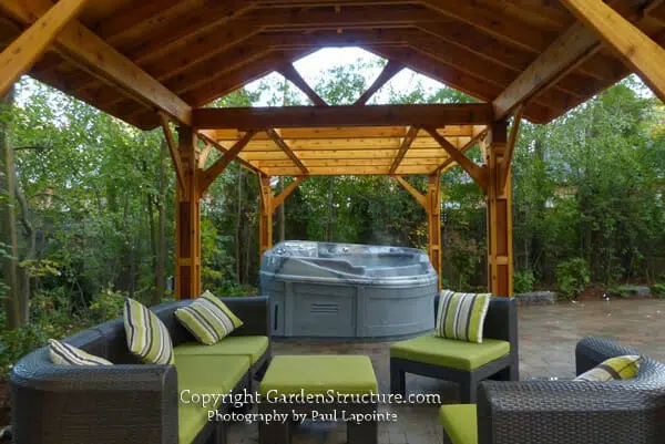 Outdoor living area in Mississauga, hot tub and pergola pavilion