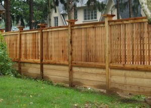 This red cedar fence was installed near Indian Rd. in Etobicoke. It features 6x6 posts and was left natural to grey.