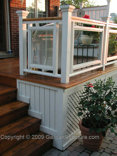 Small deck with glass rails and unique skirting detail