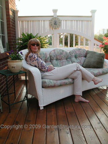 happy homeowner on gorgeous small deck