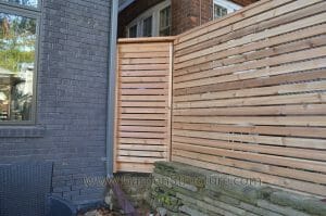 a hidden gate within a horizontal fence - Western Red Cedar Lumber