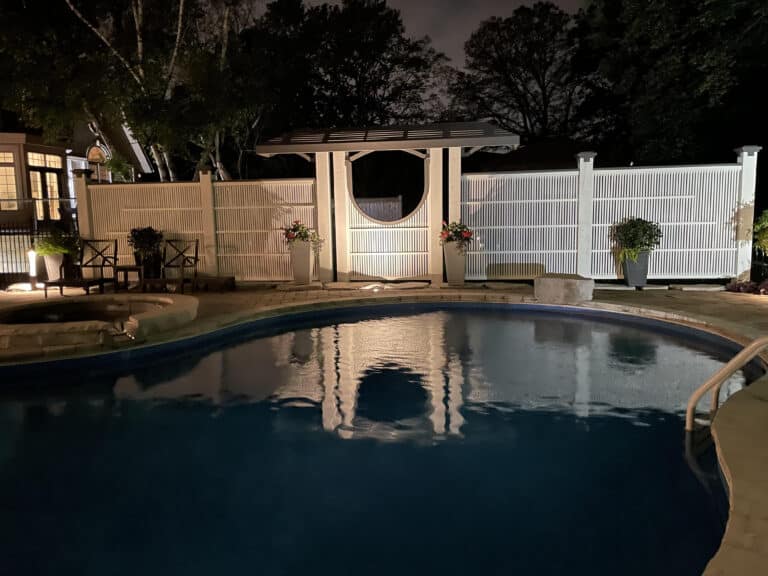 upscale garden fence at night